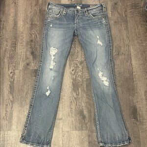 Silver Jeans Women's Light Blue Distressed Boot Cut Jeans